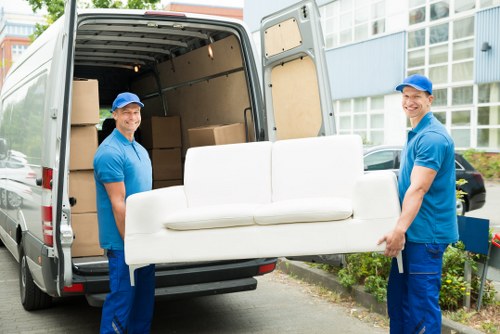 Moving team preparing items for transport during a service booking