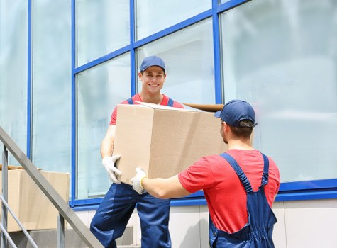 Removal team planning a flat move in Enfield with careful loading