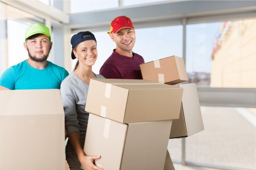 Packed boxes and furniture ready for a flat relocation in Enfield