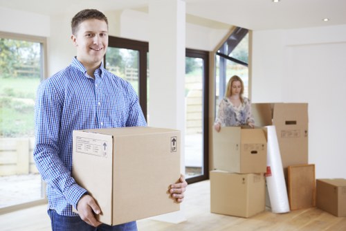 Enfield moving team organizing boxes and furniture for transport