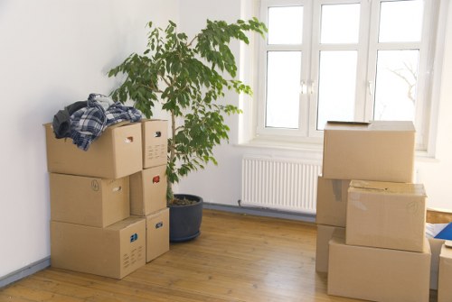 Trained staff using proper lifting techniques during relocation