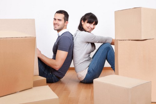 Packed household boxes and furniture ready for transport